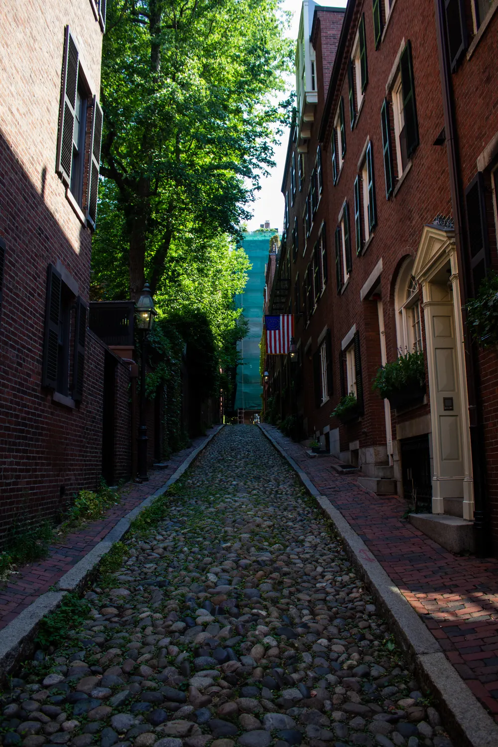 The cobblestones and brick row houses of Acorn Street on Beacon Hill, Boston