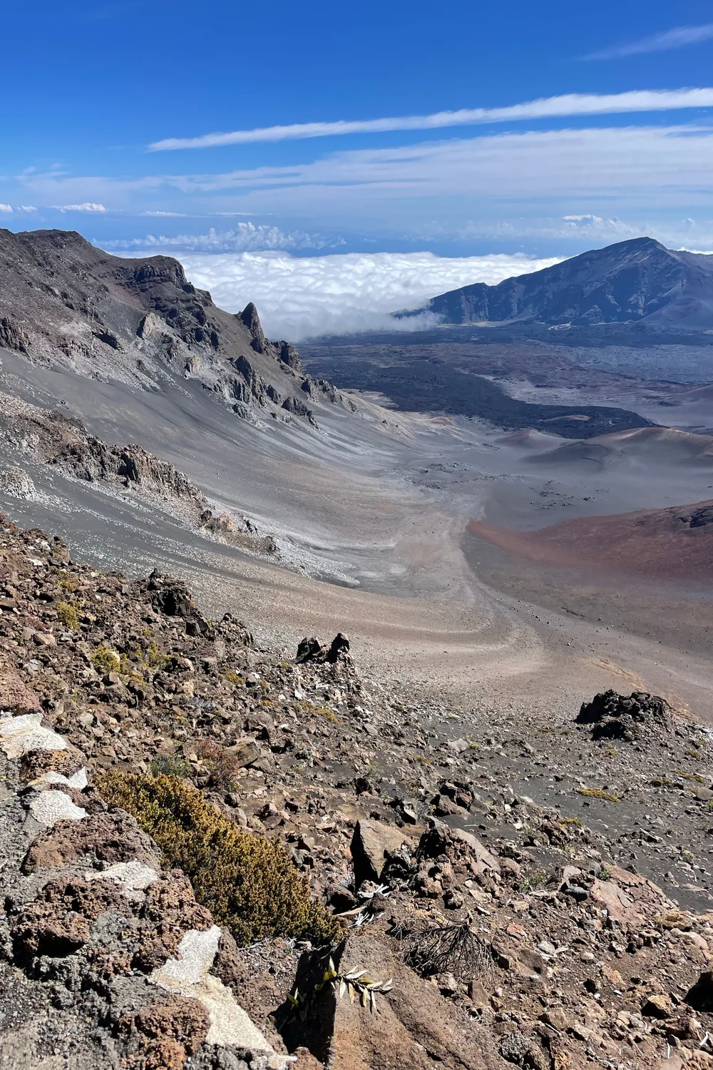 The Haleakala crater at first light with a layer of cloud sitting below the summit