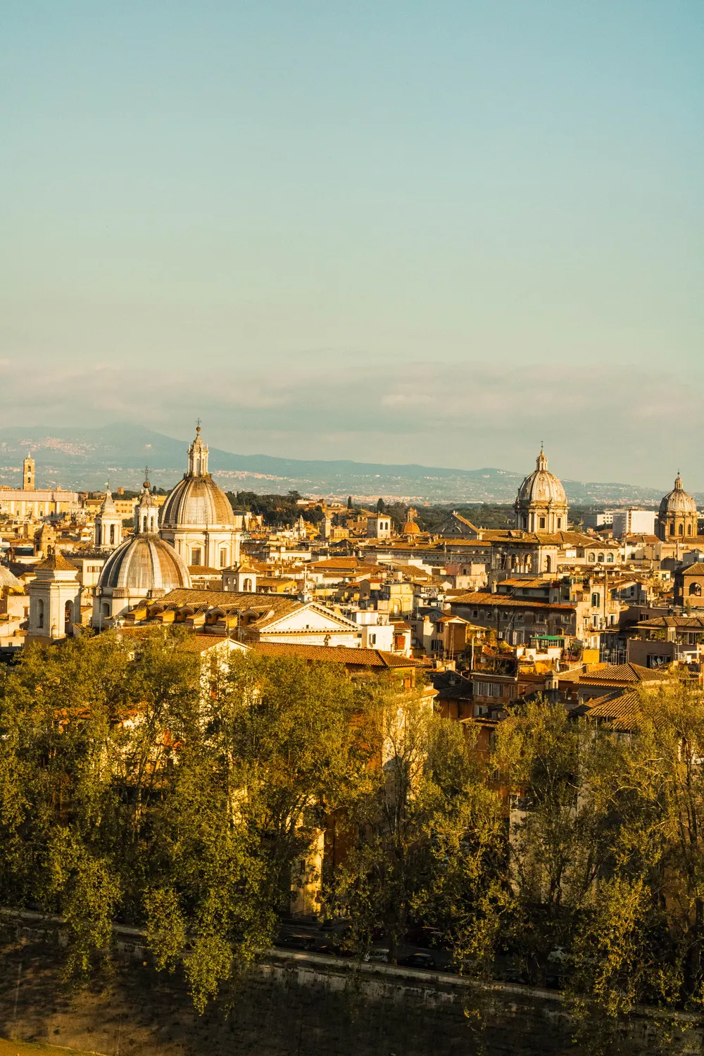 Sunset panorama over the rooftops and domes of Rome from Janiculum Hill