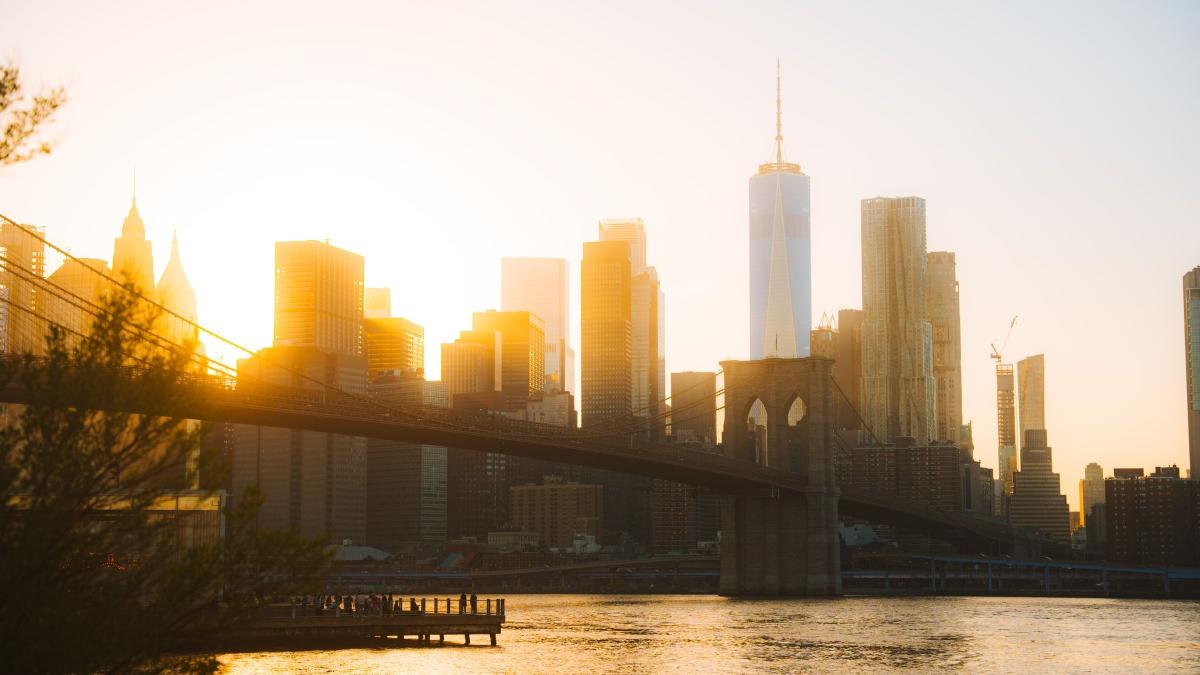 The Manhattan skyline and Brooklyn Bridge at golden hour