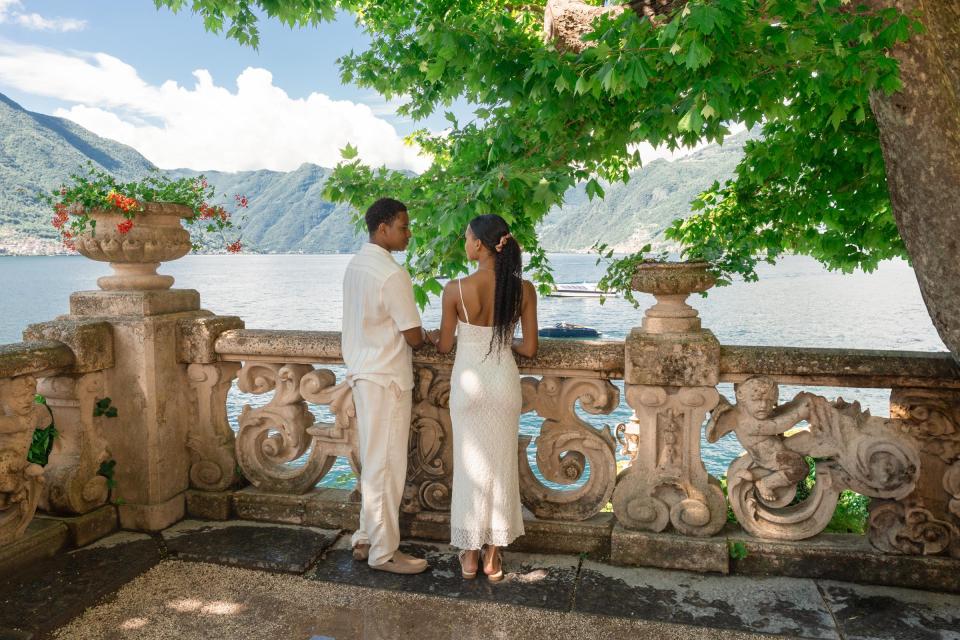 Couple at the iconic Villa del Balbianello loggia, a Star Wars filming location on Lake Como, Italy