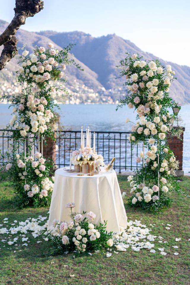Luxury floral marriage proposal setup with panoramic views of Lake Como, Italy