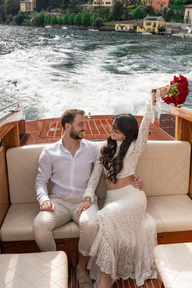 Couple enjoying a private romantic dinner overlooking Lake Como after their proposal