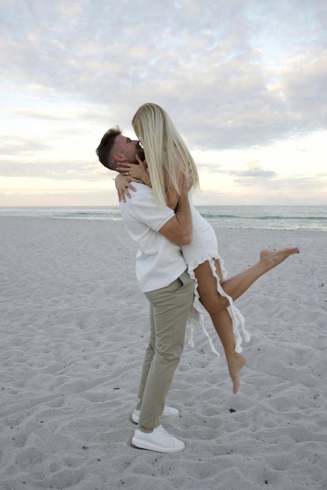 Newly engaged couple celebrating together on Miami Beach
