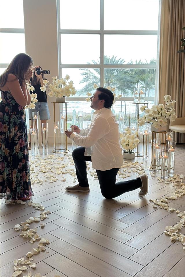 Man proposing during a romantic indoor setup in Miami